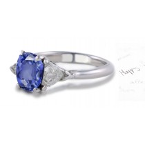 Trademark Style: 3 Stone Oval Sapphire & Shield Bullet Diamond 2 Side Gemstones Ring
