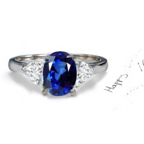 Presented with 3 Stones: 14k 3 Stone Heart Shaped Diamond & Oval Blue Fine Blue Sapphire Diamond Anniversary Ring