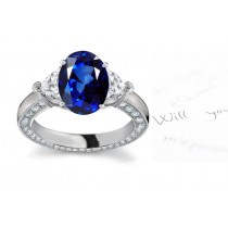 Noted As Regal Gem: 3 Stone Heart Diamond Side Gemstone Oval Fine Blue Sapphire Ring in Stone Sizes: 7x5, 8x6 mm