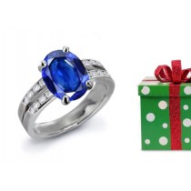 King of Gems: Large Oval Stone Accented By 2 Side Blue Stone Fine Blue Sapphire & Diamond Putnam Anniversary Volume Ring