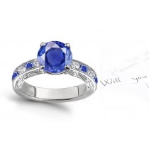 Sapphire Stories: Round Deep Blue Sapphire & Diamond Ring in Gold & Engraved Whole Sides with Hand Scrolls & Motifs