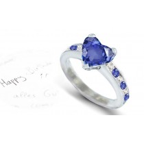 Diamond Sparkles: Popular Heart Shaped Blue Fine Blue Sapphire atop Sapphires & Diamonds Accents Ring