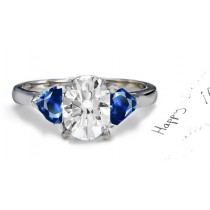 Lucian Magical Stories: This is a Signature 3 Stone Oval Fine Blue Sapphire & Heart Diamond Ring in Platinum & White Gold Cost $3200