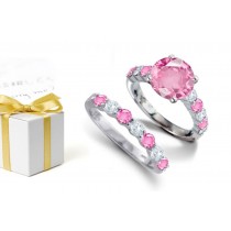 Luminous Deep Pink Stones: Sapphire atop Round Deep Pink Sapphires & Diamonds & Engagement Ring & A Sapphire Diamond Band