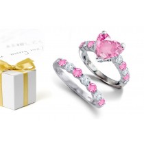 Vivid: Deep Pink Heart Sapphire atop Round Pink Sapphire & Diamond & Platinum Ring & Sapphire Diamond Band