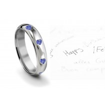 View Appreciate Burnish Set Heart Blue Sapphire Eternity Ring From All The Angles