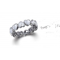 Delicate Heart Shaped Diamond Bezel Set Diamond Eternity Rings in White Gold