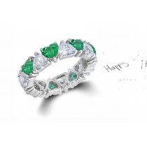 Heart Shaped Diamond Prong Set Diamond & Green Emerald Eternity Rings