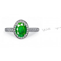This is a Richly Decorated Vintage Style Gold, Emerald & Diamond Halo & Chevron Ring with Intersecting Light Lines