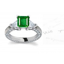 A Large Varying Assortment: A Square Emerald & Trillion 3-Stone Diamond & Platinum Halo Ring in 14k Rose Gold View Sides