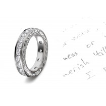 Timeless Creations: View This Stunning Platinum Wedding Band Decorated with Scrolling Flower and Petals Motifs