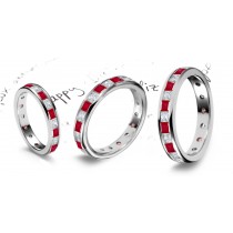 Eternity Rings: Platinum channel set square rubies and princess cut diasmonds eternity band