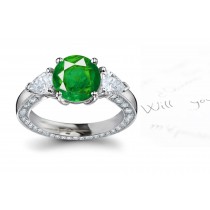 Distinguishing Mark: Richly Ornamented 3 Stone Pear Shape Cut Diamond & Round Halo Light Eternity Ring & Earrings