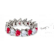 Heart Shaped Diamond Prong Set Diamond & Red Ruby Eternity Rings in Gold