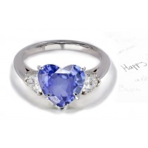 Heart-Shaped Blue tones: Fashioned in The Form of Rich Hue Butterfly 3 Stone Pear Diamond & Heart Fine Blue Sapphire Ring in White Gold