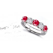 Ruby Five Stone Rings: Ruby diamond ring in platinum set with three round rubies and two round diamonds