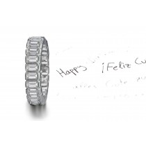 Strikingly Elegant: Seamlessly-Set Emerald Cut Diamonds in Secure Half-Bezel Gold Settings