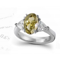 Designer Three Stone Green Diamond Oval Ring