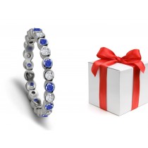 Dazzling Beauty: Bright Blue Sapphire & Diamond Bezel Set Eternity Band