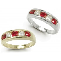 Five Stone Ruby Ring: Ruby diamond ring in platinum set with three round rubies and two round diamonds.