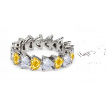 Heart Shaped Diamond Prong Set Diamond & Yellow Sapphire Eternity Rings in Gold
