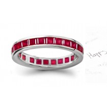 Dazzler: Perfectly Formed & Matched Square Ruby Eternity Ring in 14k Gold