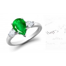 Timeless Newest Creations: 14K White Gold Features Center Pear-shaped Emerald & Diamond pear-shaped side stones 3 Stone Ring