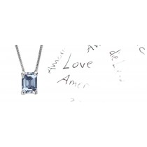 Blue Colored Diamond Pendant. Prong set emerald cut blue diamond solitaire pendant with chain