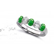 Design & Style: Five Stone Oval Diamond Emerald Anniversary Ring