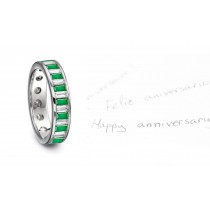  Delicate Emerald Eternity Ring: Designer Emerald Baguette and Diamonds Channel Set Men's Ring in Platinum.