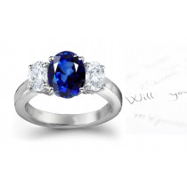 Celestial Blue Sapphire Diamond Engagement Ring: Platinum Ring with Oval Sapphire & Diamonds.