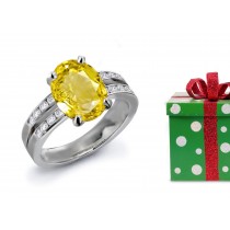 An Excellent: Premier Designer Yellow Sapphire & Diamond Engagement Ring