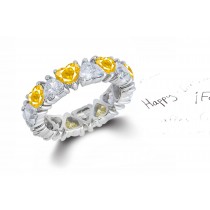 Heart Shaped Diamond Prong Set Diamond & Yellow Sapphire Eternity Rings in Gold