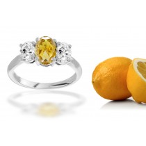 Premier Colored Diamonds Designer Collection - Yellow Colored Diamonds & White Diamonds Fancy Diamond Three Stone Engagement Rings