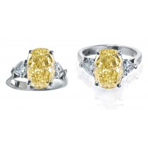 Yellow Diamond Rings: Platinum Yellow Oval Diamond and White Trillion Diamonds Engagement Rings