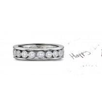 Celebrate Handcraftsmanship: In Stock A Center Row of Strong Bezel Set Diamonds Bordered in Platinum Dazzling Stackable Diamond Bands