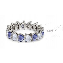 Heart Shaped Diamond Prong Set Diamond & Blue Sapphire Eternity Rings 