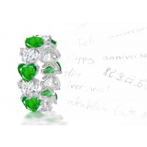 Fanciful Subjects: "Special Design" Heart Emerald & Diamond Eternity Band in White Gold