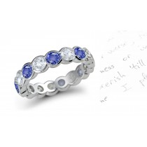 Glowing: Half Bezel Set Round Blue Sapphire & Diamond Eternity Band