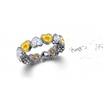 Delicate Heart Shaped Diamond Bezel Set Yellow Sapphire & Diamond Eternity Rings