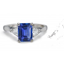 Rich Blue Sapphire Diamond Engagement Rings: Platinum Sapphire Octagon and Trillion Diamonds.