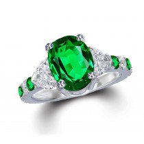 Three Stone Rings With Center Emerald & Further Diamond Accents on Sides