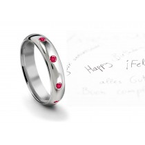 Thoughful Arrangement Mens & Womens Burnish Round Ruby Eternity Ring