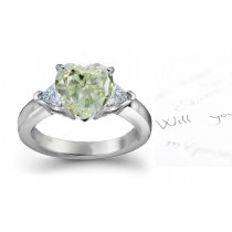 Gleaming Center Heart Green Diamond & Trillion White Diamond Accents Engagement Ring in Green Gold