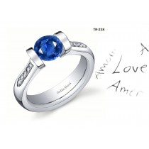 Premier Diamond Jewelry: Tension Set Blue Sapphire Diamond Rings