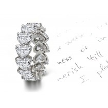 A Perfect Love Story: Prong Set Shimmering Heart Diamond Eternity Band in Platinum & Gold with Overhead Radiance
