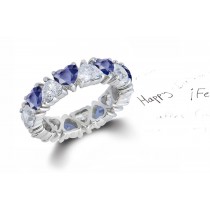 Heart Shaped Diamond Prong Set Diamond & Blue Sapphire Eternity Rings in Gold