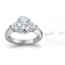 Three Stone Oval Diamond & Side Heart Diamonds Three Stone Anniversary Ring