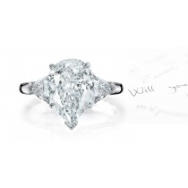 Center Pears & Side Trillion Diamonds Three Stone Ring