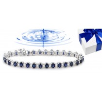 Gold Sapphire and Diamond Tennis Bracelet.